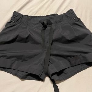 Women’s black drawstring waist Lululemon athletic shorts